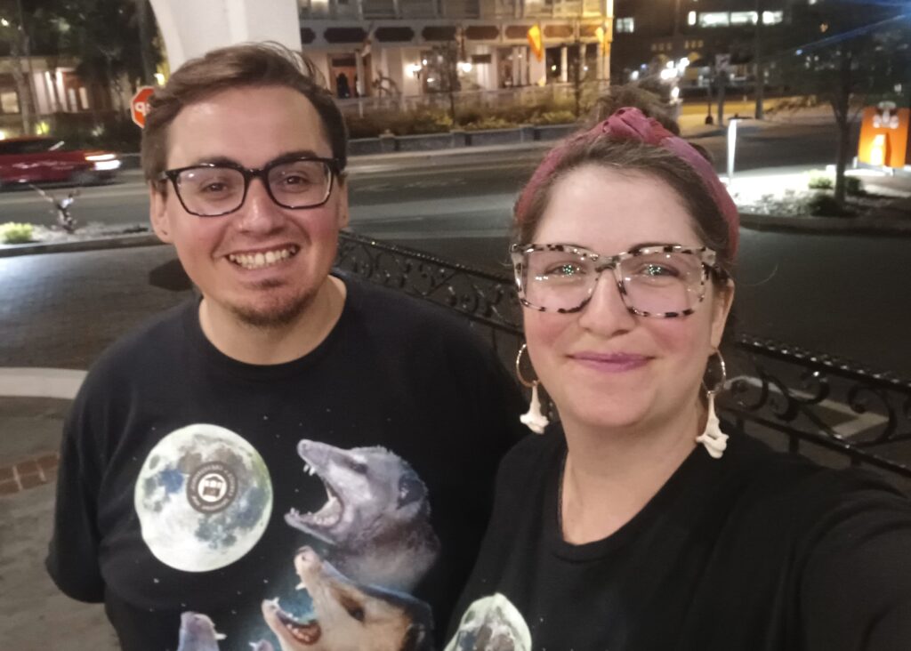 two members of the client services team posing for a photo