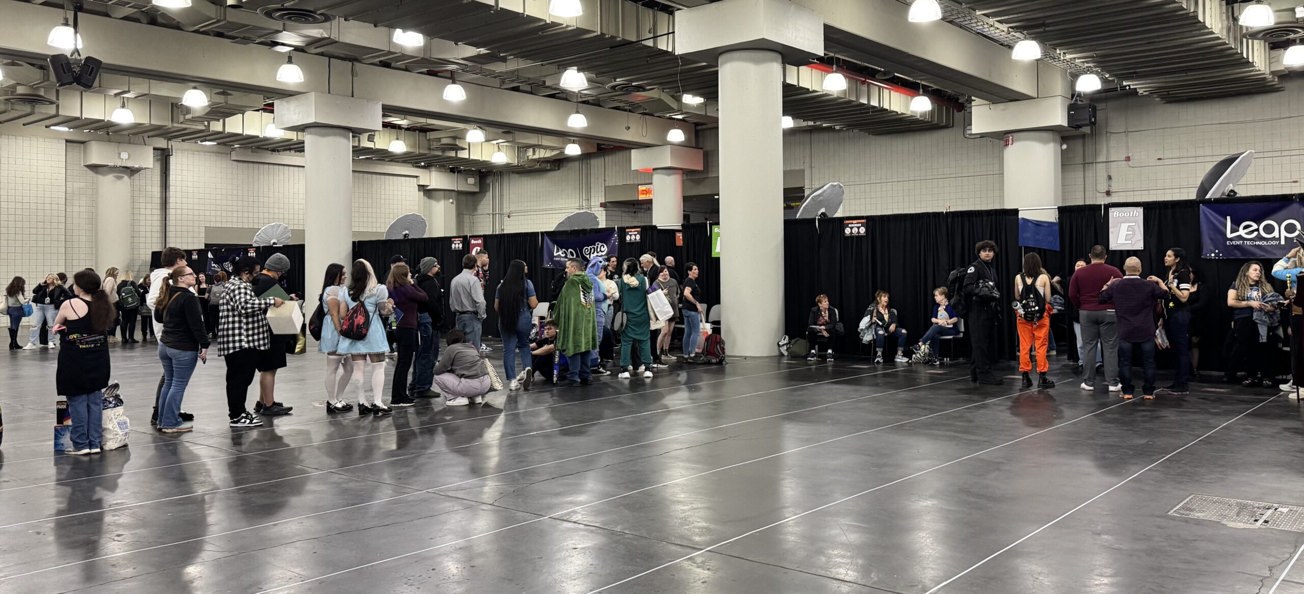 attendees lining up for a celebrity photo op experience